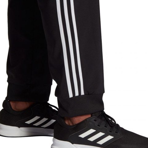 Spodnie adidas Essentials Tapered Cuff 3 Stripes M GK8980 Spodnie adidas Essentials Tapered Cuff 3 Stripes M GK8980